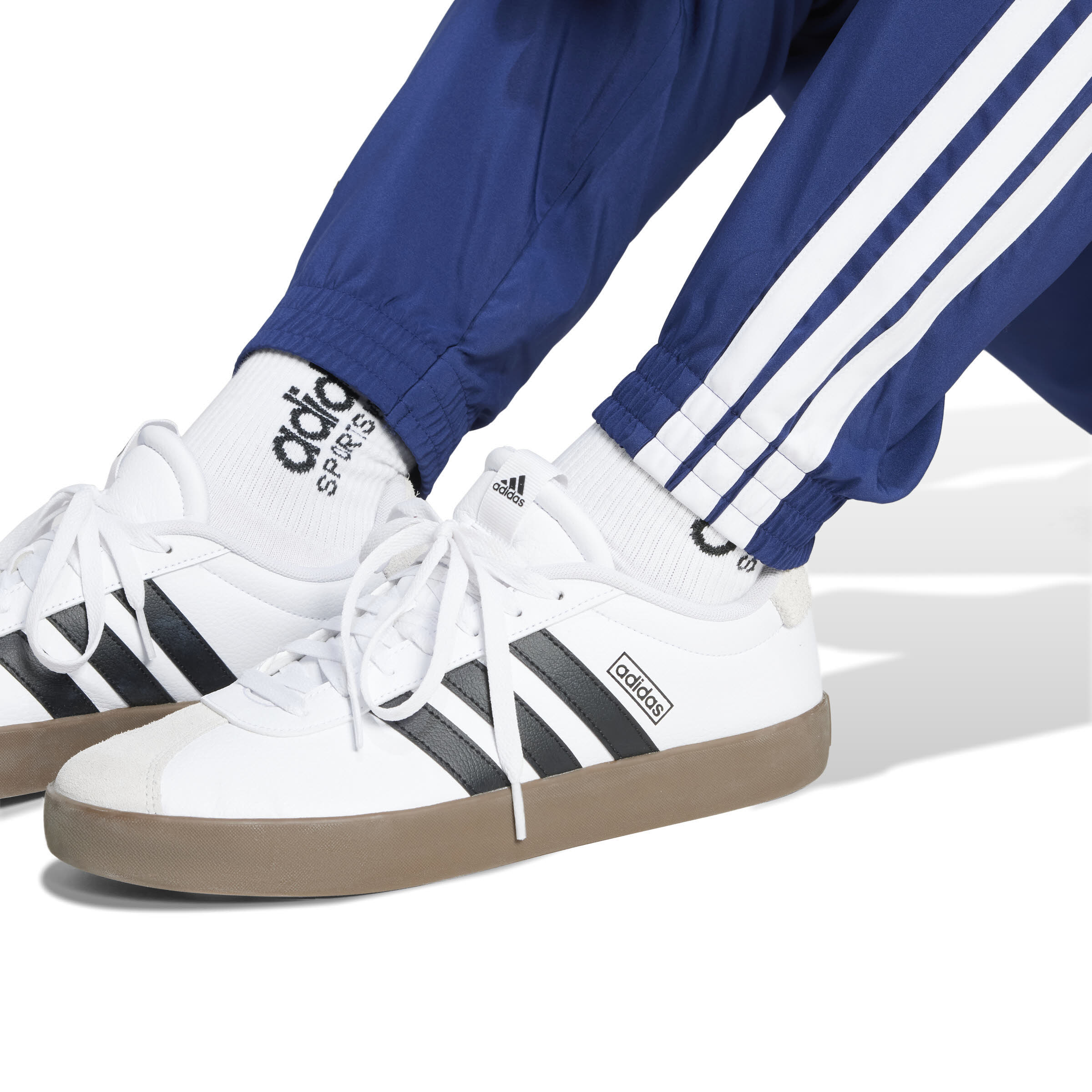 adidas Essentials 3-Streifen Woven Hose Trainingshose Jogginghose Herren blau