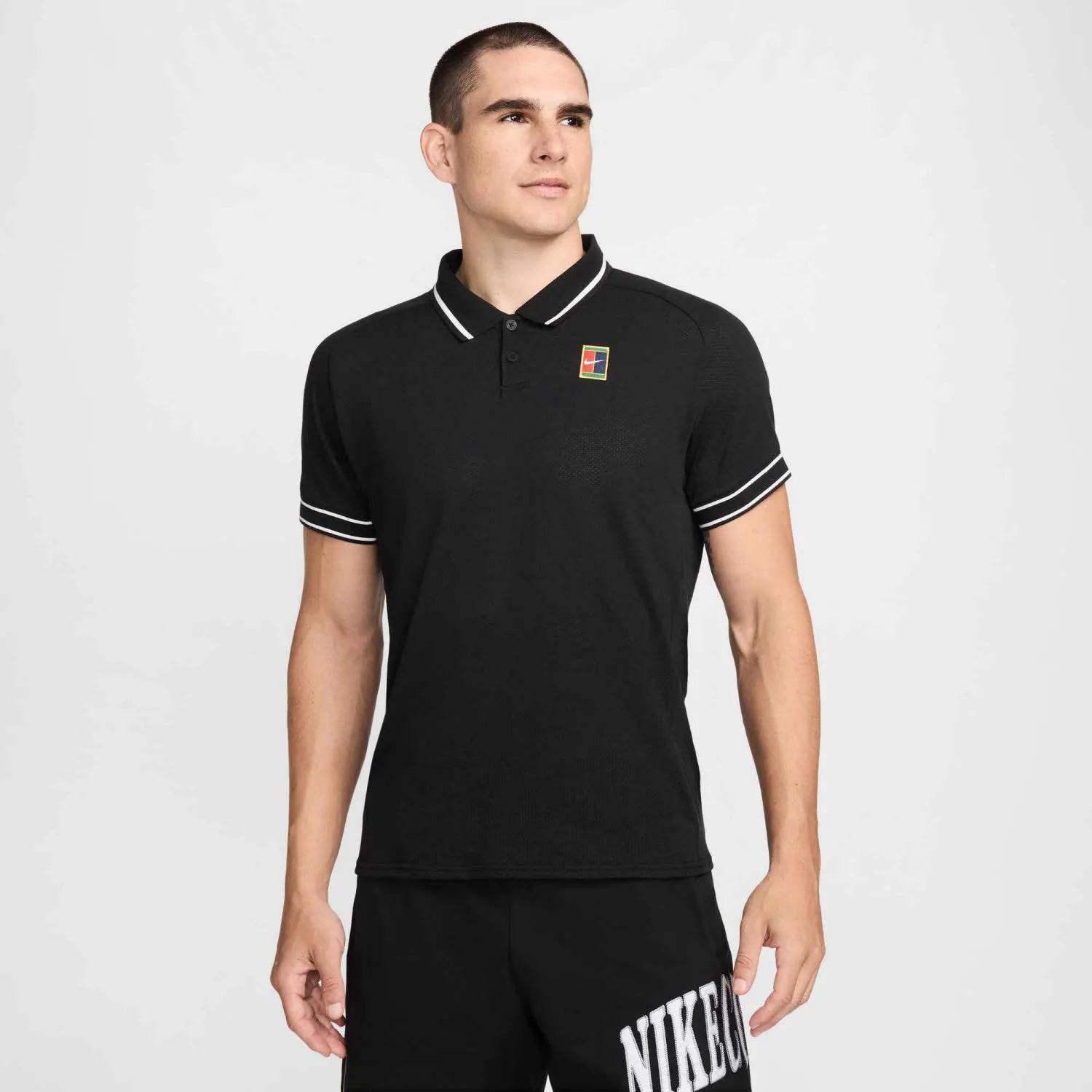 NikeCourt Heritage Men"s Herren Tennisshirt Poloshirt schwarz