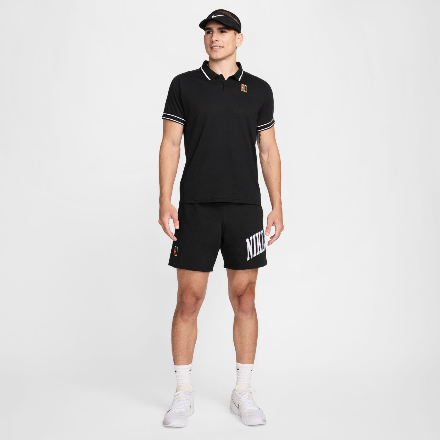 NikeCourt Heritage Men"s Herren Tennisshirt Poloshirt schwarz