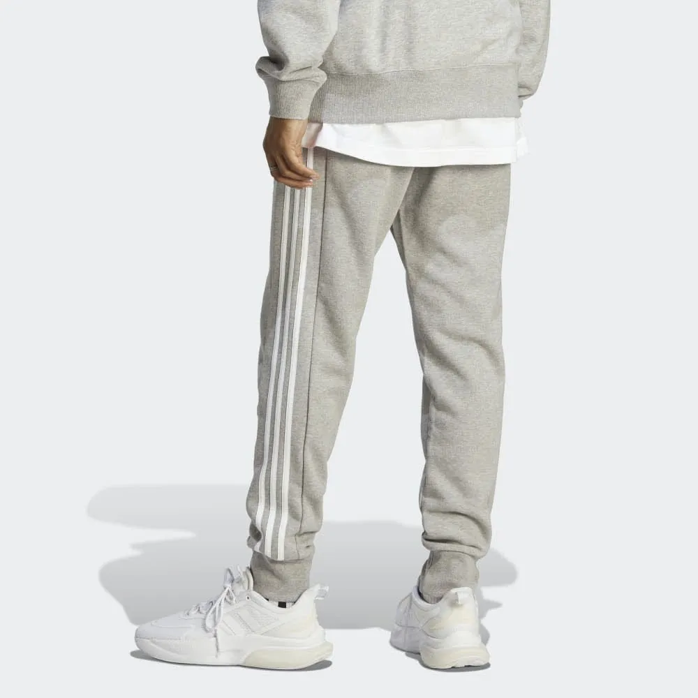 adidas ESSENTIALS FRENCH TERRY TAPERED CUFF 3-STREIFEN Herren Hose Jogginghose grau