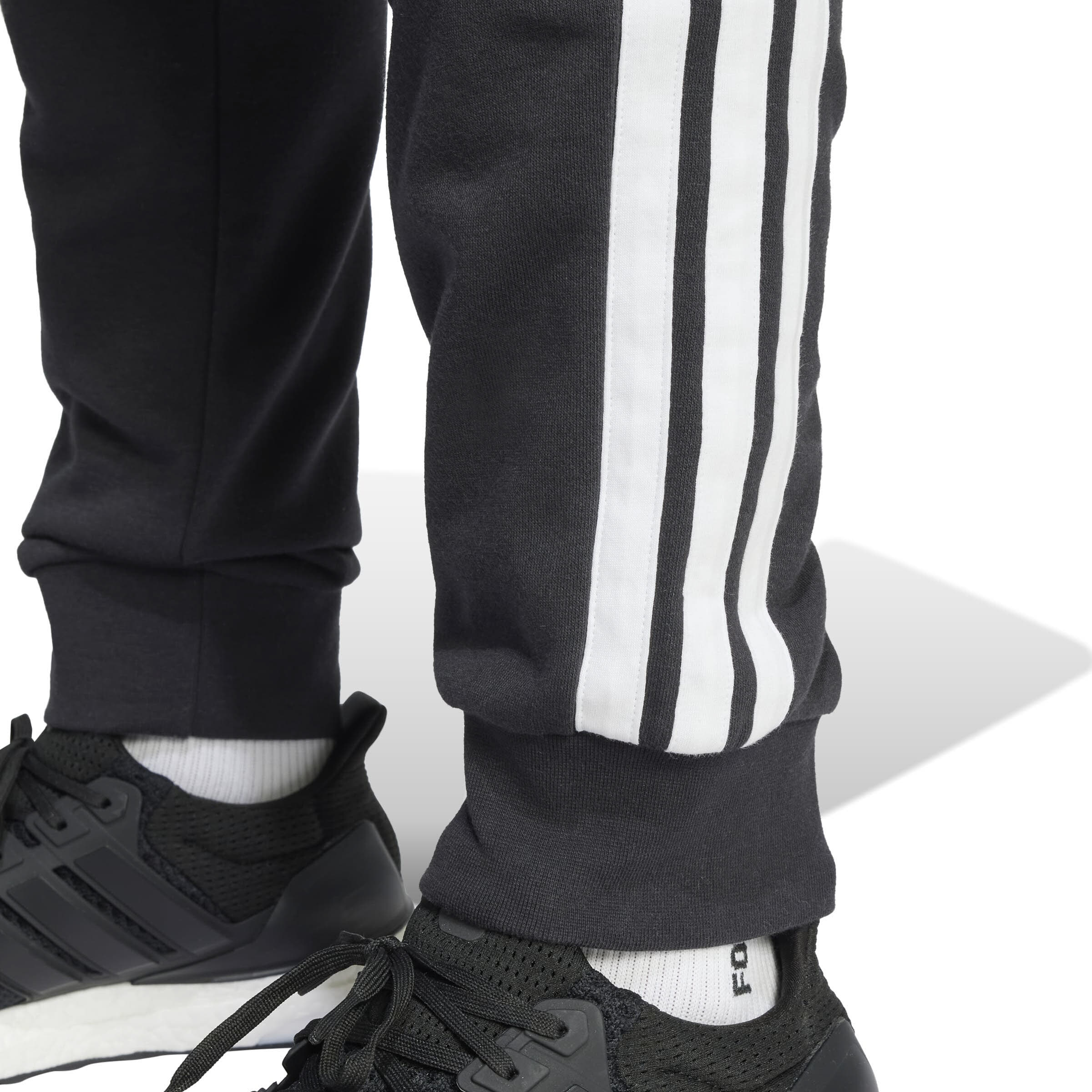 adidas Essentials 3-Streifen French Terry Hose Jogginghose Herren schwarz